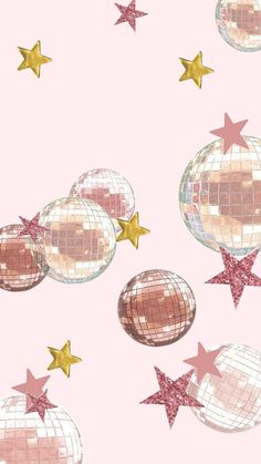 several shiny disco balls and stars on a pink background