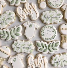 decorated cookies are arranged on a table