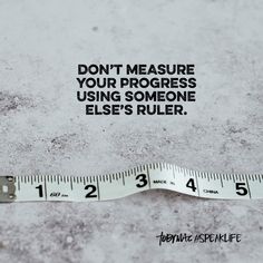 a measuring tape with the words don't measure your progress using someone else's ruler