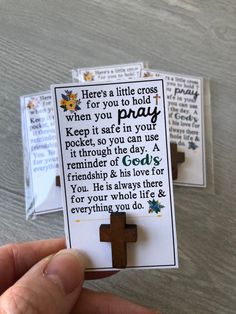 someone is holding up some cards with a cross on them and the words, here's a little cross when you pray