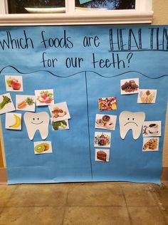 a bulletin board with pictures and words on it that says which foods are healthy for our teeth?