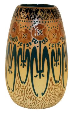 a vase with designs on it is shown in brown and blue colors, sitting upright