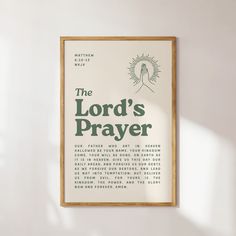 the lord's prayer is displayed in front of a white wall