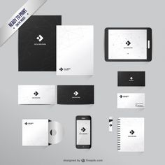 various stationery mockups with white and black designs on the front, back and sides