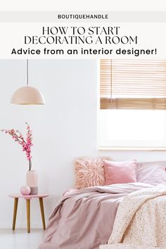 a bedroom with pink and white decor on the walls, bed linens and pillows