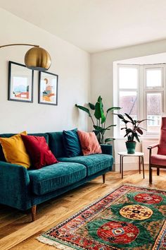 a living room filled with furniture and a rug