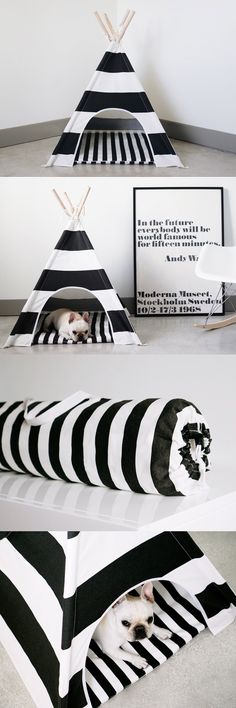 there is a black and white cat bed in the shape of a pyramid