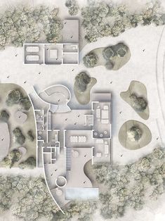 an aerial view of a house surrounded by trees and bushes, with the ground plan drawn out