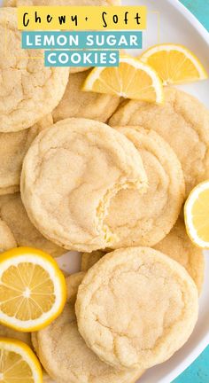 lemon sugar cookies on a plate with slices of lemon