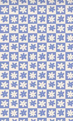 a blue and white checkerboard pattern with flowers on the side, as if it is