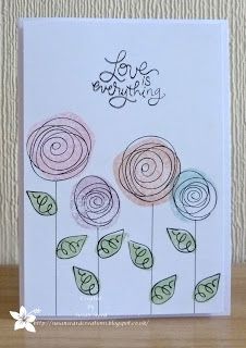 a handmade card with flowers on it