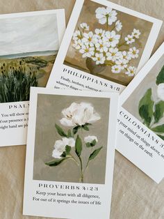 four cards with pictures of flowers on them