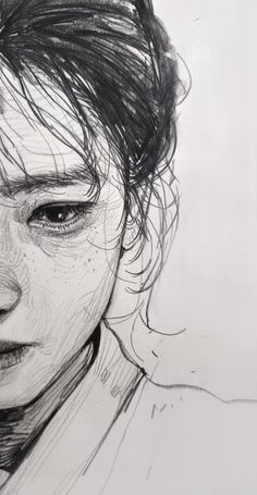 a black and white drawing of a woman's face