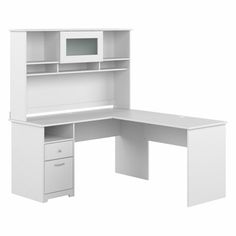 an office desk with a microwave on top and drawers below it, against a white background