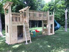 a wooden play set with a slide and climbing frame