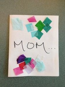 a piece of paper with the word mom written on it, surrounded by colored squares