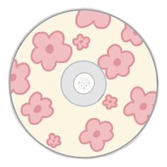 a pink and white flower pattern on a cd cover with the disc facing outward to the camera