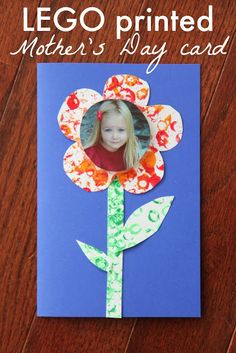 a mother's day card with a flower made out of paper and the words lego printed on it