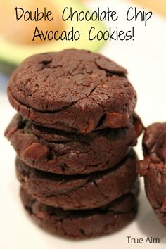 double chocolate chip avocado cookies stacked on top of each other