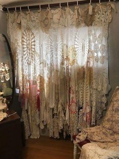 the curtains in this room are covered with lace