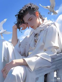 a woman sitting on top of a white building next to birds flying above her head