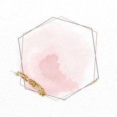 a pink and gold hexagonal frame on a white background with some gold glitter