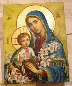 an icon of the virgin mary and child jesus with flowers in her hands on a white background