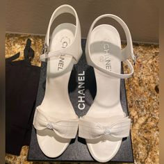 Hello!!! I Hope You Will Love These Shoes As Much As I Did When Purchasing Them! I Have Never Worn This Shoes Other Than For Pictures At My House For About 10 Mins For My Wedding Day!! These Are Brand New Chanel Bow White Sandal Heels!! I Bought These At The Wynn Las Vegas Chanel Boutique! They Are So Special To Me But They Are Too High For Me So I Want To Sell Them! If You Have Any Questions Please Let Me Know!! All Original Packaging Of The Box. These Are Perfect Shoe To Have In Your Collectio Wedding Heels Luxury, White Heels Chanel, Christian Dior Wedding Shoes, White Luxury Heels, Coquette Shoes Aesthetic, Classy White Heels, Chanel White Heels, White Ysl Heels, White Chanel Heels