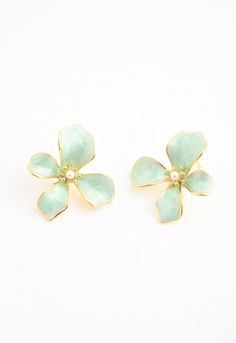 Our Hope In Bloom Earrings make an unforgettable statement you’ll want to pair with every look! Stunning mint enamel on 14K plated gold shapes the 3D flower earring, creating a beautiful stage for the mother of pearl within. Style yours with a gorgeous Springtime maxi dress, or add a pop of mint color to your weekend vibes tee and shorts. As you wear and gift our Hope In Bloom Earrings, celebrate the power of hope you share with the survivors beginning a new life of freedom at Starfish Project. May this hope bloom in every season! Box size and color may vary.  Materials: 14K Gold plated brass with enamel earrings，925 Silver ear postsHypoallergenic; lead and cadmium free with nickel content less than 100 ppm. Size: 1. 14 inchesSuggested MSRP: $47. 99 wipe clean Starfish Project, Casually Chic, Hope Gifts, Flower Earring, August Birthstone Jewelry, July Birthstone Jewelry, Jewelry Ring Box, Pearl Jewellery Earrings, Men's Jewelry Rings