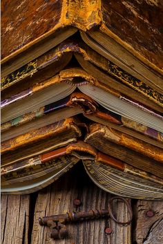 an open book sitting on top of a wooden door