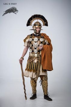 a man dressed in an ancient roman costume