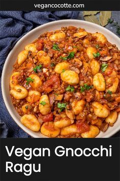 vegan gnocchi ragu in a white bowl on top of a blue cloth