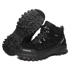 a pair of black hiking boots on a white background with the words outdoors written below them