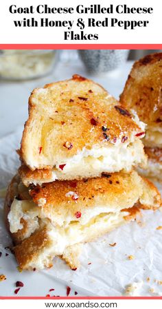 two grilled cheese sandwiches stacked on top of each other with text overlay that reads goat cheese grilled cheese with honey & red pepper flakes