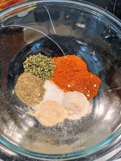 spices and seasonings in a glass bowl