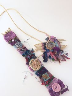 "Fun woven boho tapestry set:  cuff bracelet and necklace, in soft fibers.   Woven from various cotton, linen, rayon, poly, hemp and silk fibers.  Some of these fibers are upcycled.  This set has shades of purple, lavender, raspberry, blue, green.   These unique tapestry weavings are little art exhibitions, tiny abstractions, color studies. Wear them with many different outfits, as they have many colors in them, and coordinate with a wide range of shades.  Notice how the same necklace can coordi Unique Tapestry, Fabric Cuff Bracelet, Felted Jewelry, Fiber Art Jewelry, Textile Art Embroidery, Boho Cuff, Jewelry Magazine, Hemp Necklace, Boho Tapestry