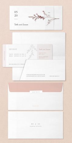 three envelopes with flowers on them, one in pink and the other in white