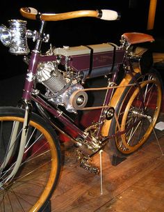 a close up of a bike on a wooden floor