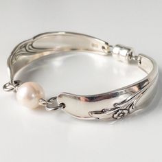 This Gorgeous Bracelet Features Two Vintage Silverplate Silverware Handles With A Large White Freshwater Pearl In The Center. It Has Our Signature Heavy Duty Magnetic Clasp And Is Sized At 7" Vintage Bracelets Silver, Vintage Charm Bracelet Silver, Chunky Jewelry Silver, Silver Jewelry Stack, Pearl Jewlery, Chunky Silver Jewellery, Silver Bracelet Stack, Silver Pearl Jewelry, Spoon Bracelet