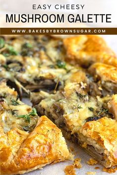 an easy cheesy mushroom galette is cut into slices