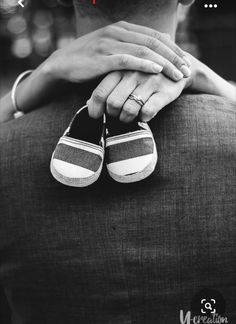 black and white photograph of a couple holding hands