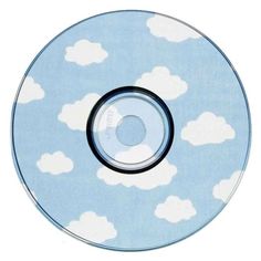 a cd that has clouds on it