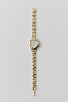 Heart Linked Watch | Urban Outfitters Heart Watch Gold, Watches Women Elegant, Dainty Watches Women, Small Face Watches For Women, Feminine Watches Classy, Gold Heart Watch, Gold Jewelry Combo, Amazon Watches Women, Good Watch Women