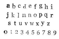 an old fashioned alphabet with numbers and symbols on it's sides, all in black ink