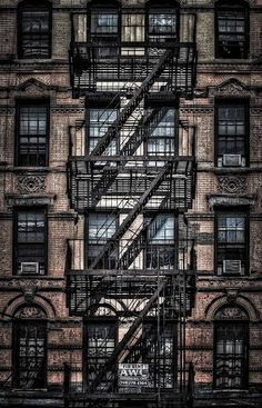 an old fire escape on the side of a building