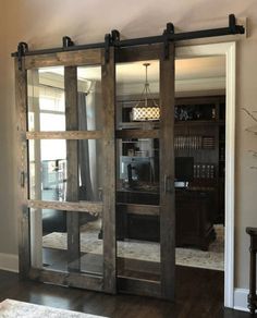 a living room with sliding glass doors in it