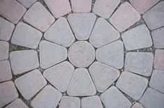 a close up view of a circular stone pattern