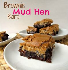 brownie mud hen bars are on white plates