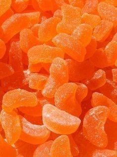 close up view of orange gummy bears