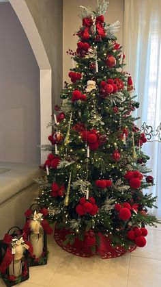 a christmas tree decorated with red and white ornaments